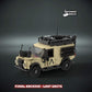 Lego Brick-built desert military vehicle model on a dark background with custom UV printed parts and 'The Defender Brick' branding.