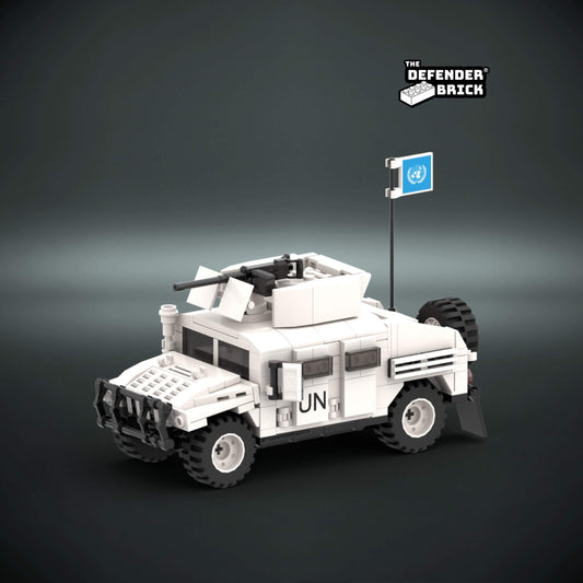 Lego Scale Model of a UN armored vehicle made from interlocking bricks on a dark background with custom UV printed parts and 'The Defender Brick' logo.