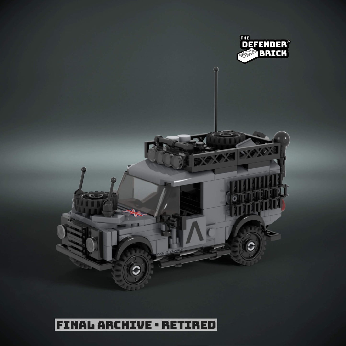 lego scale model military truck with urban warfare - grey livery and custom UV printed parts, on a dark background with 'The Defender Brick' branding.