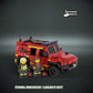 custom Lego Red fire fighters truck with two figures and custom UV printed parts on a dark background, featuring 'The Defender Brick' logo.