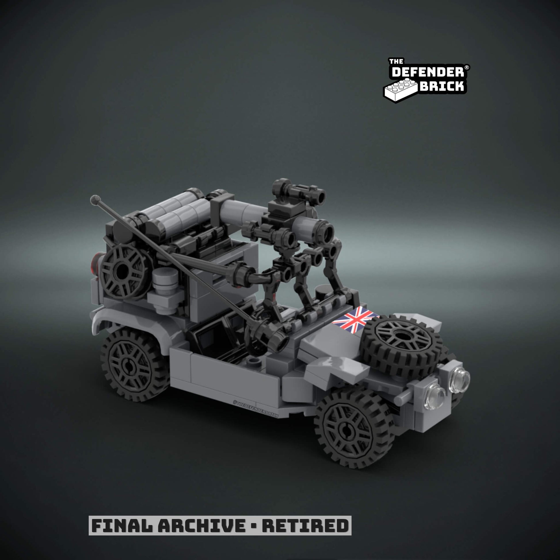 Custom Lego tactical vehicle in urban grey color made of interlocking bricks with a custom UV printed British flag on a dark background, branded 'The Defender Brick'.